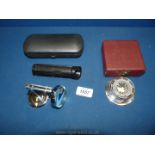 A car Altimeter 2 3/4" diameter, together with a small boxed magnifying glass,