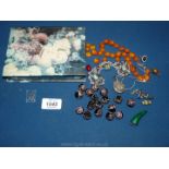 Miscellaneous vintage beads, silver charm and opal miner charm.