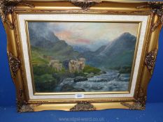 An ornately framed Oil on canvas depicting Highland Cattle grazing by a fast flowing stream with