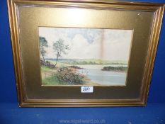 A framed and mounted Watercolour depicting a River scene with a footpath by side and dwellings in