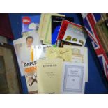 A quantity of music sheets and books.