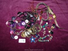 A quantity of costume jewellery including necklaces, earrings, etc.