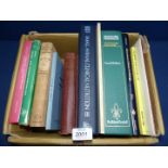 A box of books including Veterinary Medicine,