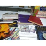 A box of books: Photography, Cross Stitch,