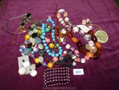 A quantity of costume necklaces and bracelets.