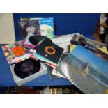 A bag of vinyl records: Don Mclean, Dione Warwick, Barbara Streisand etc.