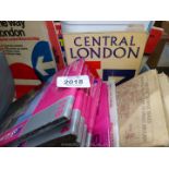 A box of Ordinance Survey maps, street maps and road maps.