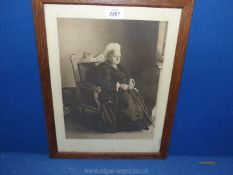 An Oak framed copyright Print of Photograph by Russell & Sons.