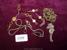 Miscellaneous pocket watch keys and chains.