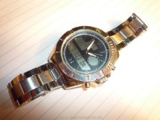 A heavy polished finish ''Executive Elite'' quartz movement Wristwatch having black grid pattern