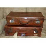 Two leather suitcases with old labels including B.- R. Southern region. cabin number, etc.