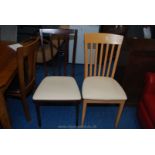 Two highback dining chairs.