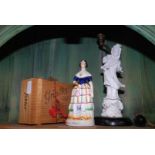 A Staffordshire figure of Jenny Lind, table lamp and cigar box.
