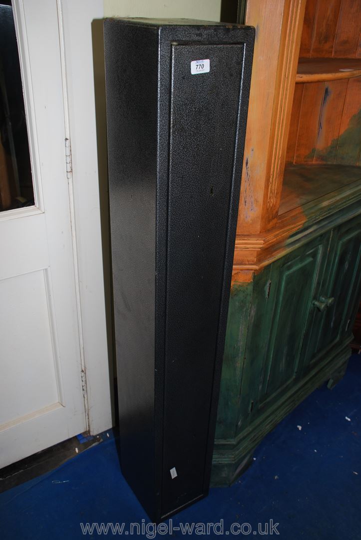 A metal three gun cabinet,