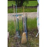 A set of nylon drainage rods, garden tools, etc.