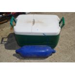 An Igloo cool Box and a boat buoy.