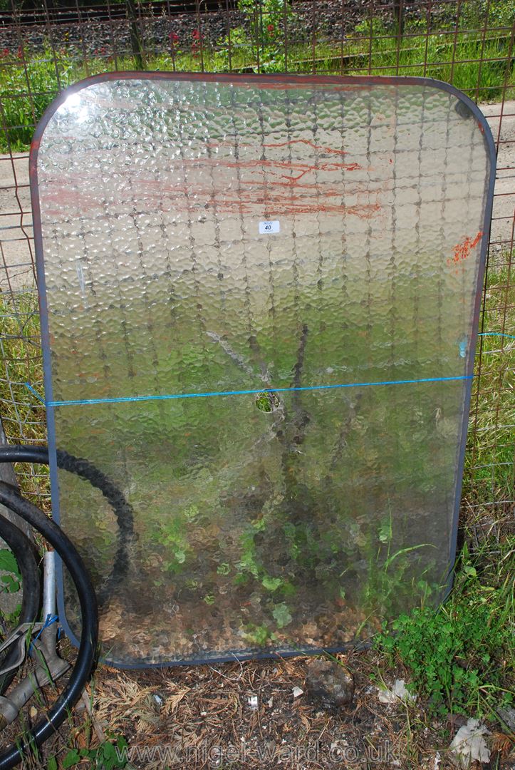 A glass top for a patio table, 48'' x 33''.