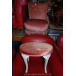 A pink velour bedroom chair and a similar stool.