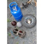 A pneumatic wheel barrow tyre (A/F), aluminium fishing float, glass float, etc.