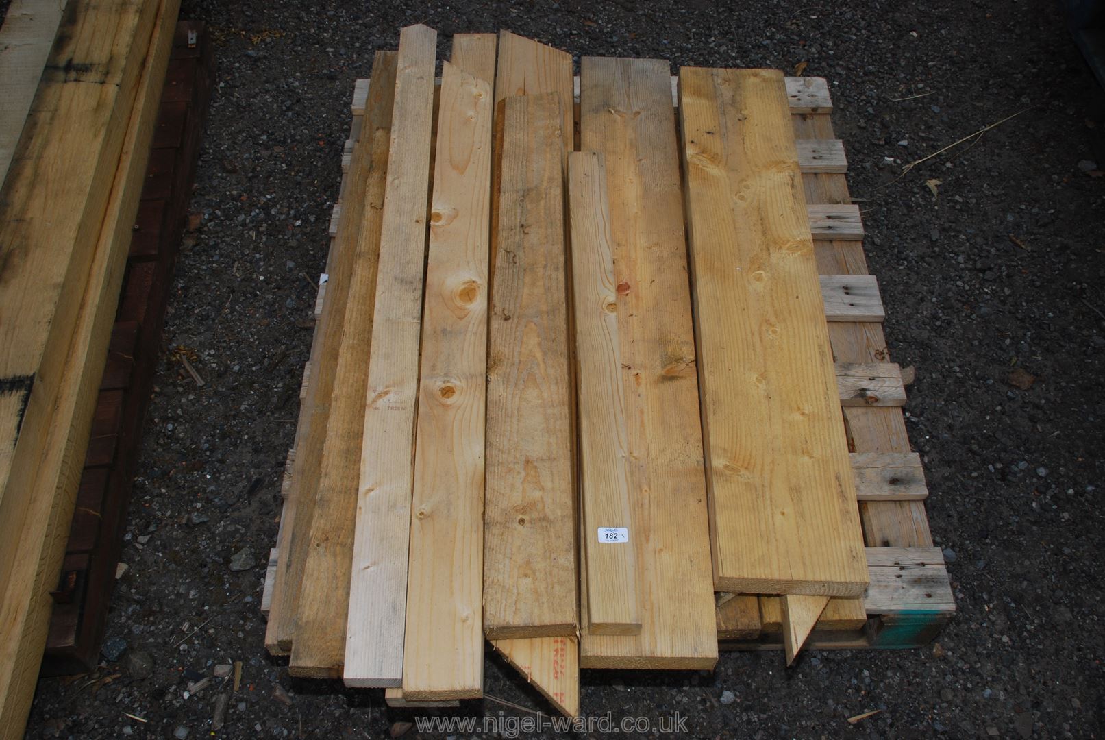A pallet of various softwood timber, 3'' x 2'', 4'' x 2'' and 7 1/2'' x 2''.