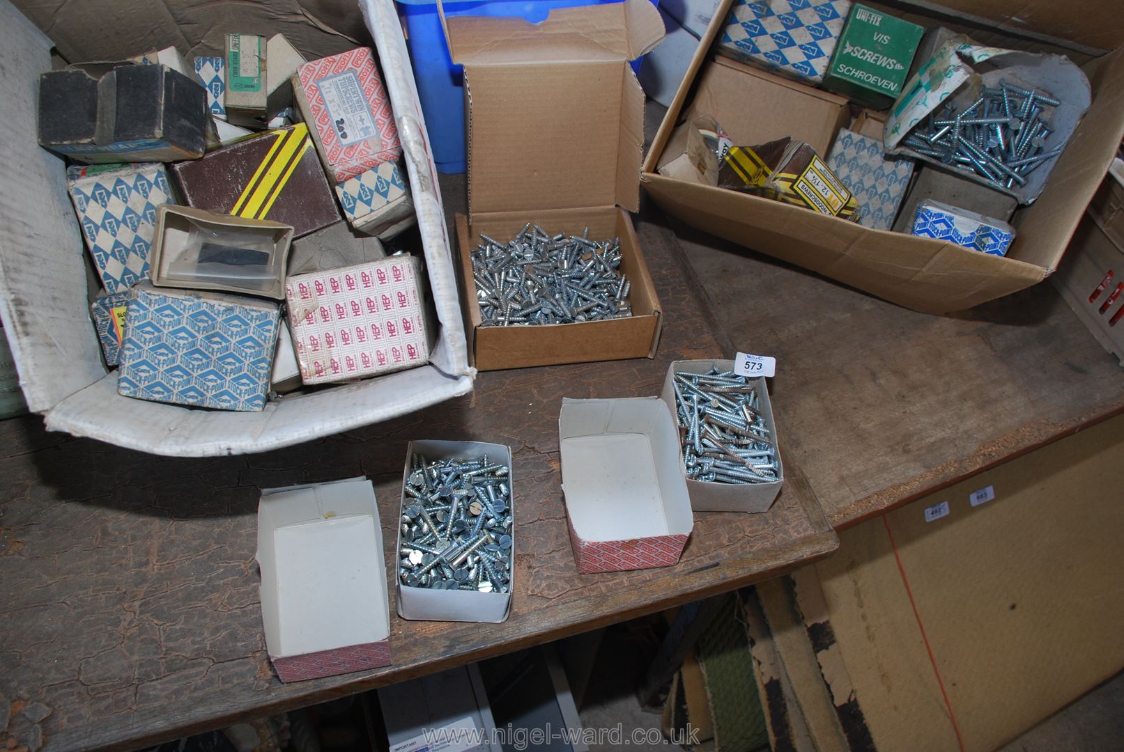 Two boxes of various wood screws, fixings etc.