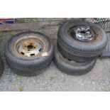 Five various tyres and rims.