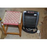 A string seated stool and halogen heater.