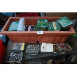 A quantity of tobacco tins containing various fixings, etc.