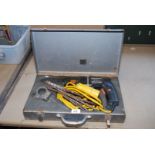 A cased 110v AEG drill with bits.