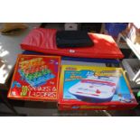 An Air Hockey board game and a folding exercise mat etc.