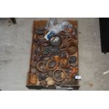 A quantity of wooden knobs and curtain rings.
