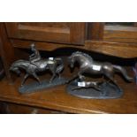 Two metal effect horse figures.