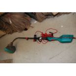 An electric strimmer.