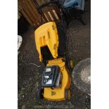 A JCB LS45 petrol Lawnmower with grass box (requiring attention).