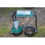 A paraffin greenhouse Heater, two pots and a garden kneeler/seat.