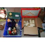 A box of large used candles, nativity set, ornaments etc.