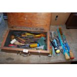 A wooden box of various hand tools etc.