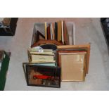 A large box of glazed picture frames, mirror etc.