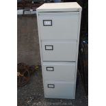 A four drawer Filing Cabinet, 4'4'' tall.
