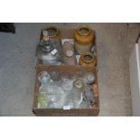 A box of various glass, stoneware jars and bed warmer.