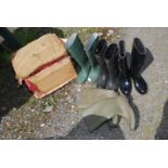 Four pairs of wellies, two green,