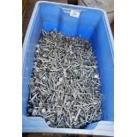 A tub of 40 mm roofing nails.