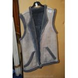 A lambswool/suede style leather grey gilet.
