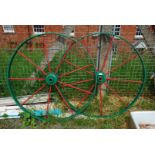 A painted pair of cast iron wagon Wheels, 43'' diameter.