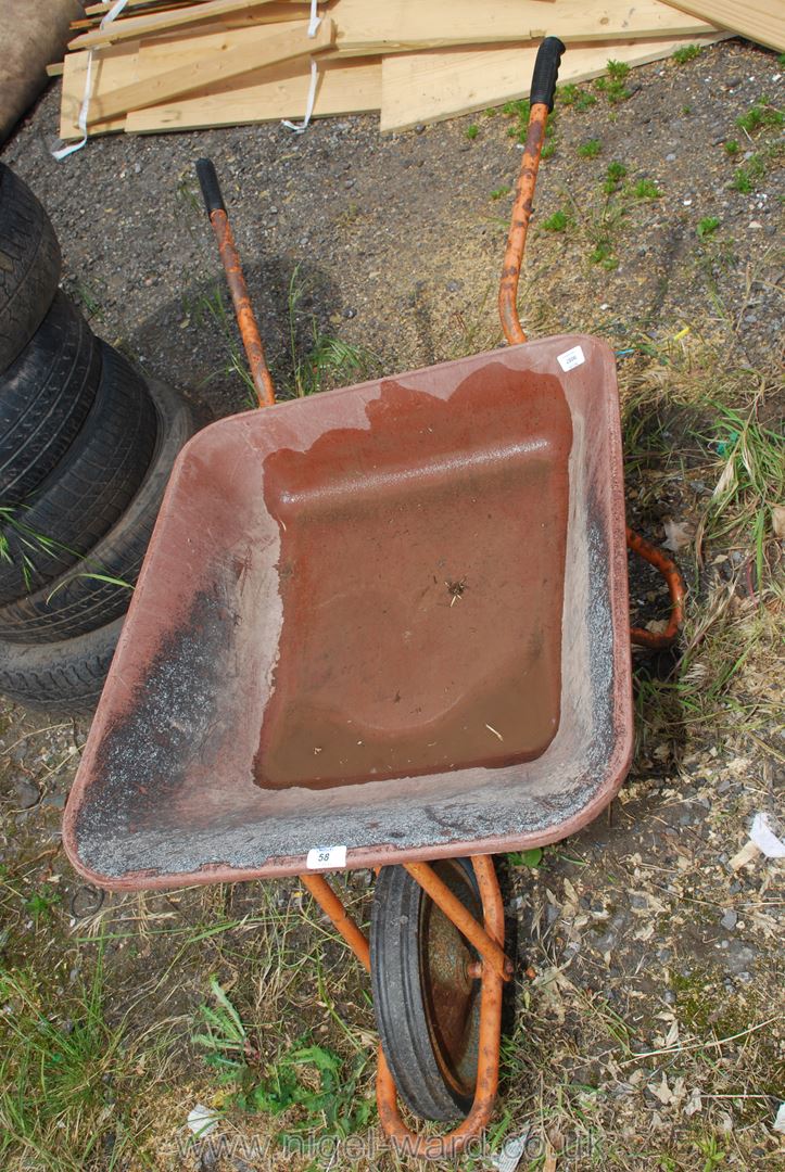 A plastic skip Wheelbarrow with solid tyre.