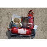 A hand fire extinguisher and enamel jugs.