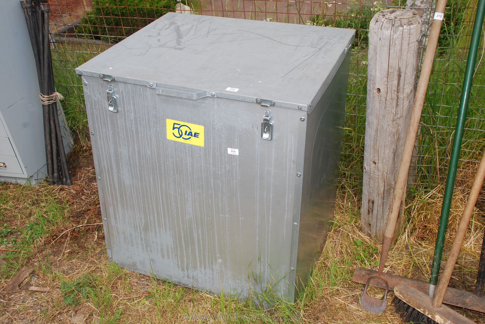 A galvanised grain store, 33'' x 34'' x 28''.