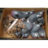 A box of wood pigeon decoys and rabbit snares.