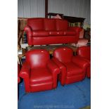 A three seater leather style red sofa and two chairs.