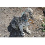 A concrete Spaniel garden ornament,